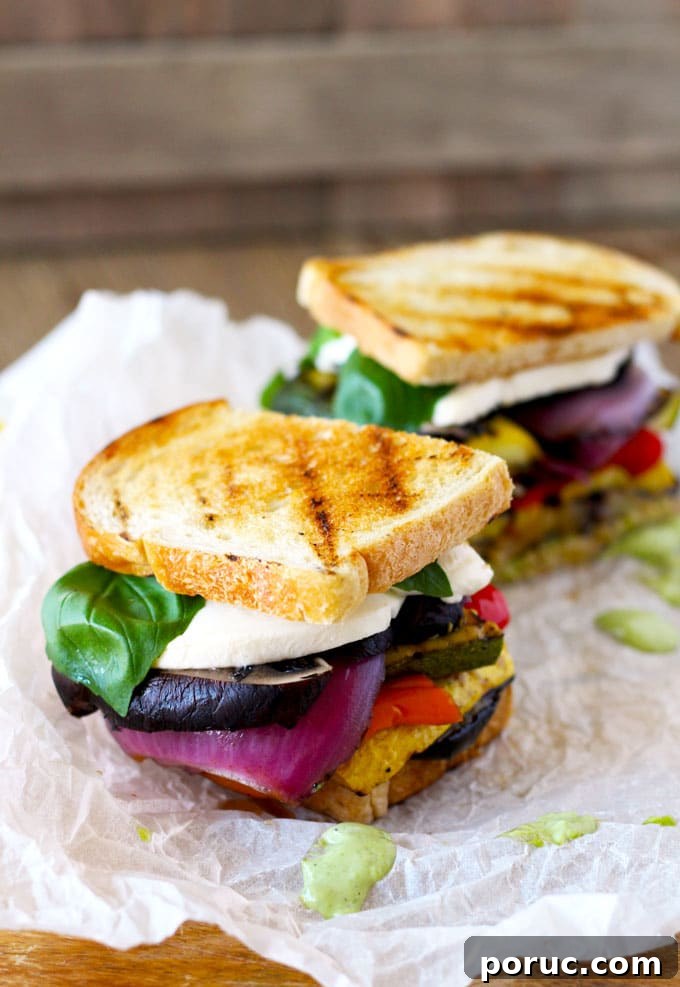 Grilled Vegetable Sandwich with Fresh Mozzarella & Basil Aioli 5 Side shot of two Grilled Veggie Sandwiches.