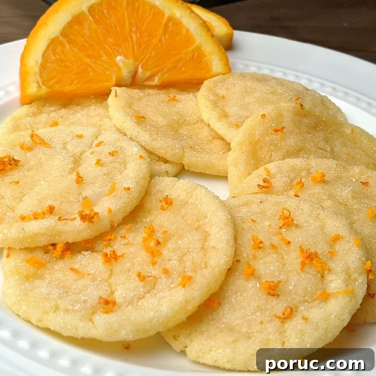 8 Delicious Desserts Under 100 Calories Each 6 stack of orange sugar low cal cookies