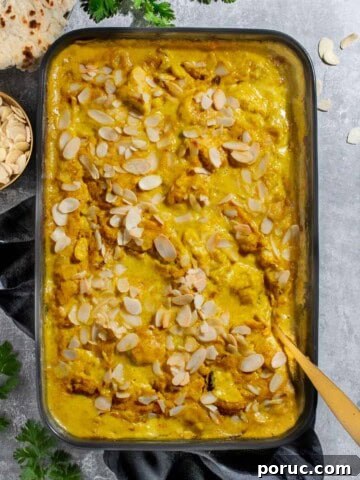 Chicken Pasanda curry in a black baking dish.