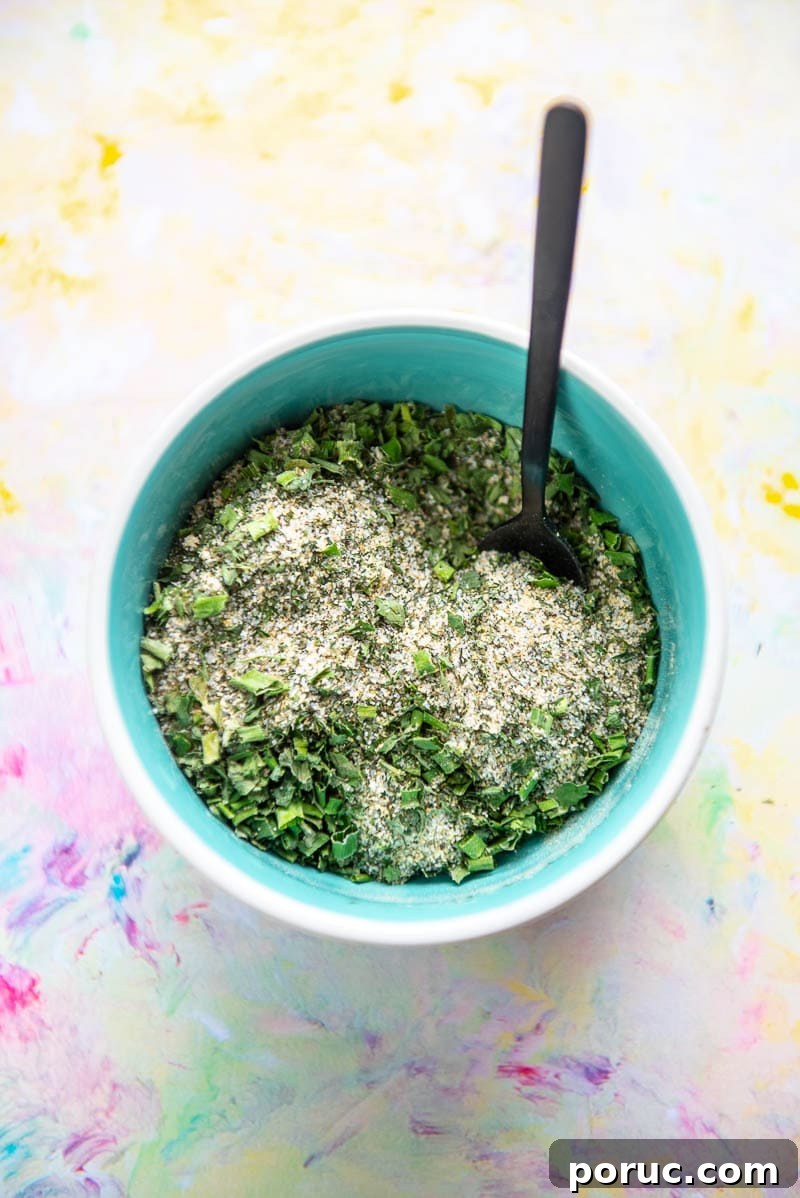 DIY Ranch Seasoning Mix Recipe – Quick Homemade Blend for Dip & Dressing 2 blue bowl filled with seasonings for ranch mix and tiny black spoon