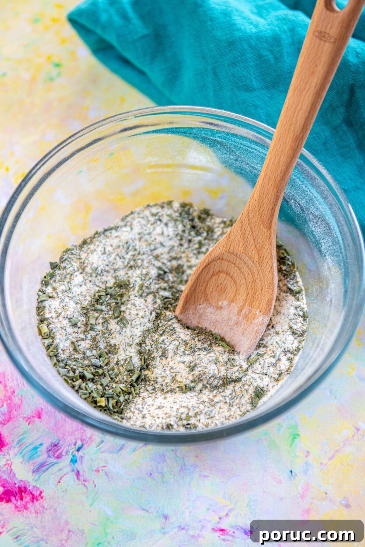 DIY Ranch Seasoning Mix Recipe – Quick Homemade Blend for Dip & Dressing 7 glass bowl filled with ranch dressing mix with wood spoon