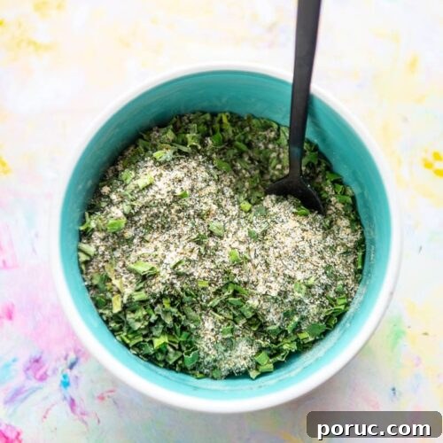 DIY Ranch Seasoning Mix Recipe – Quick Homemade Blend for Dip & Dressing 10 blue bowl filled with seasonings for ranch mix and tiny black spoon