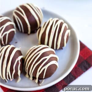 Peppermint Oreo Truffles on a white background with a red and black checkered napkin