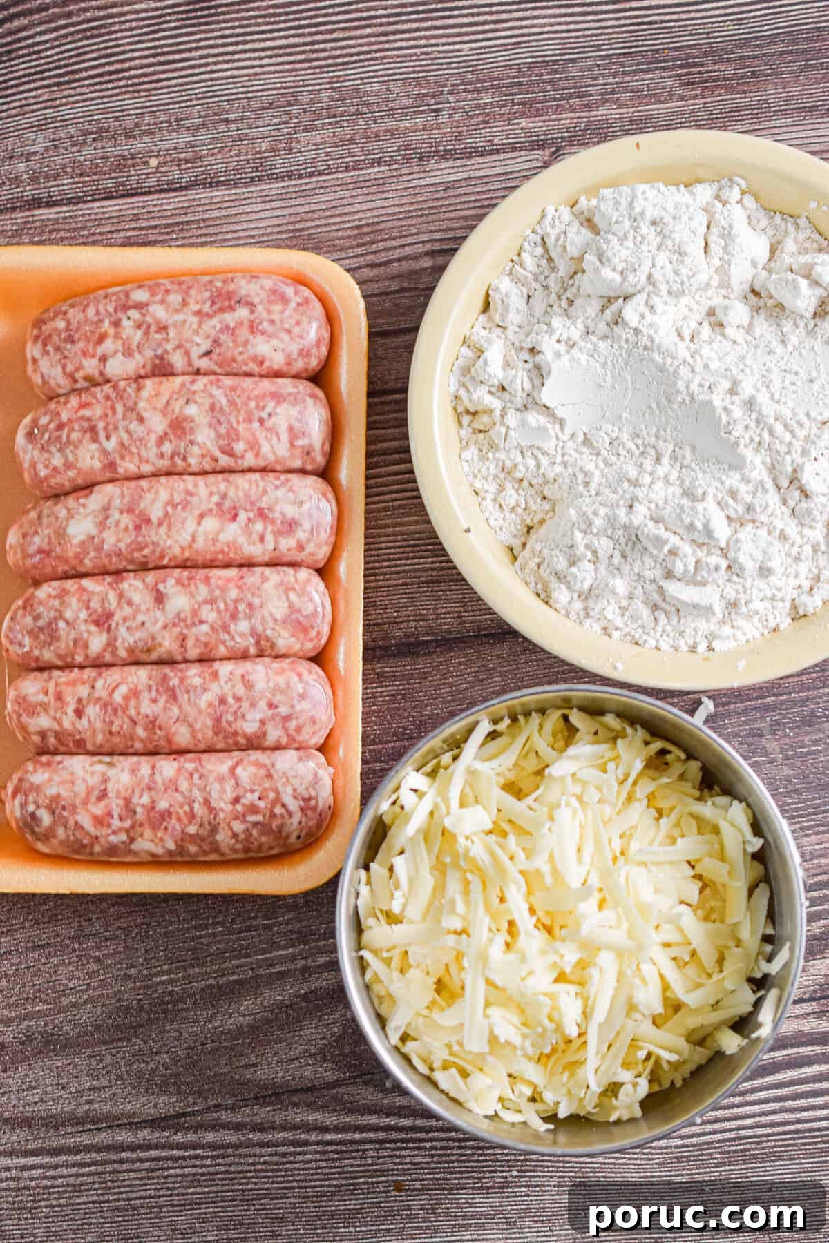 Cheesy Sausage Balls with 3 Ingredients: Quick Party Appetizer 3 The ingredients to make Bisquick sausage balls are laid out.