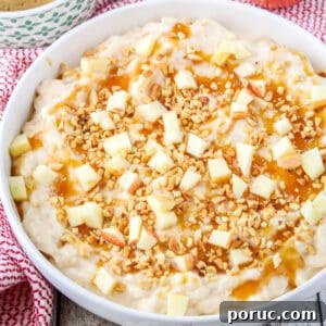 Caramel Apple Cheesecake Dip Recipe for Fall Parties 2 square image of caramel apple cheesecake dip topped with caramel, nuts, and fresh apples