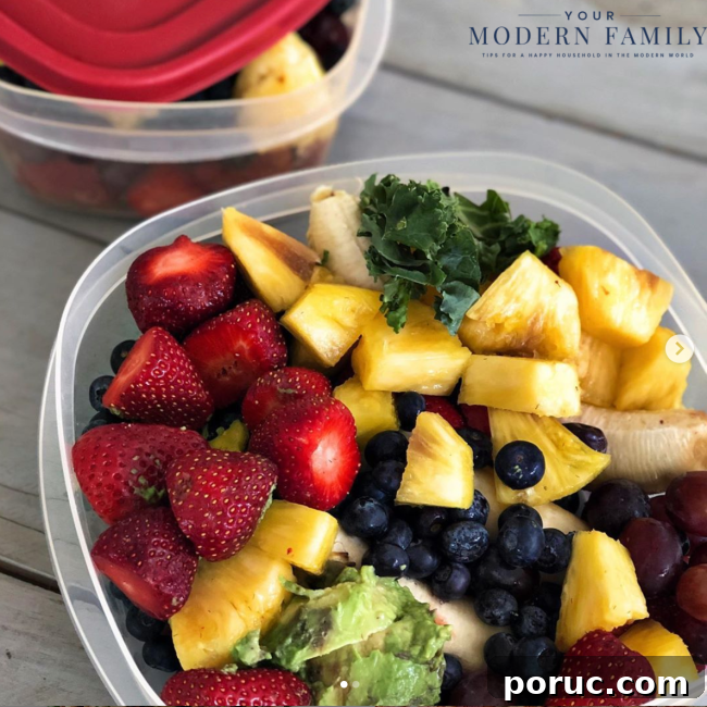 I'm Full—Still Want a Snack? How to Stop All-Day Snacking 3 A bowl of fruit salad on a plate, with Strawberry
