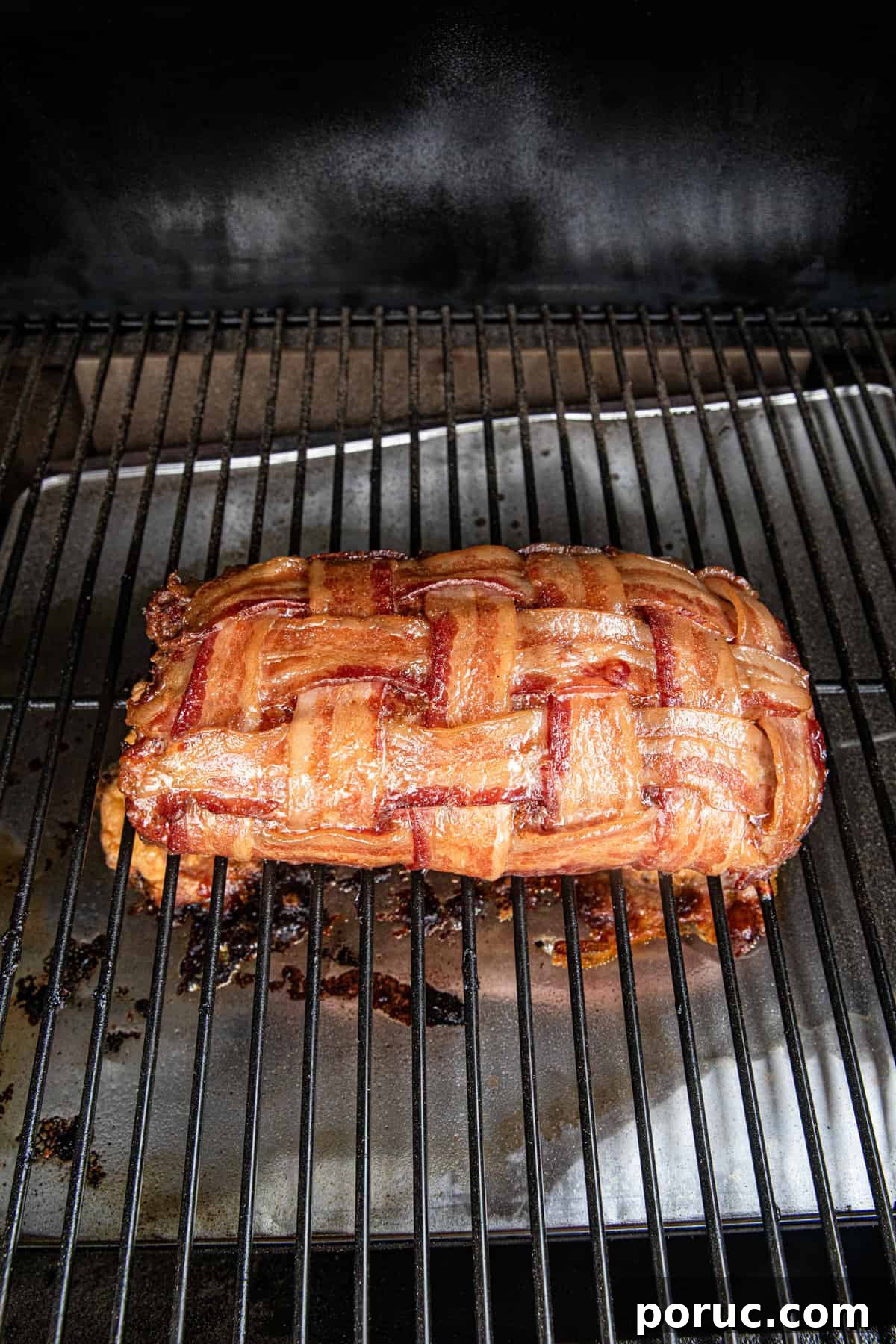 Ultimate Bacon Explosion Recipe: Stuffed Bacon-Wrapped Meatloaf 12 Bacon Explosion on grill