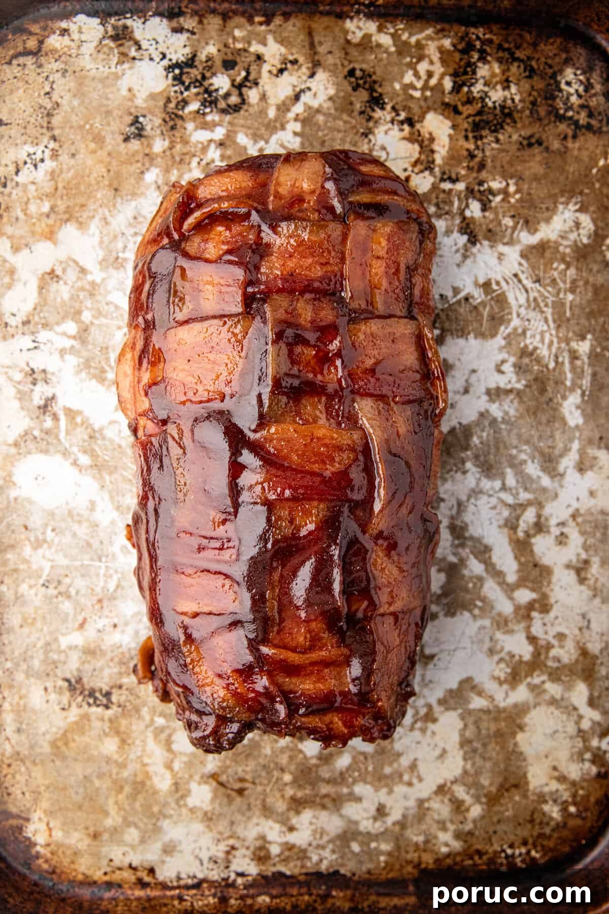Ultimate Bacon Explosion Recipe: Stuffed Bacon-Wrapped Meatloaf 14 Grilled Bacon Explosion smothered in BBQ sauce