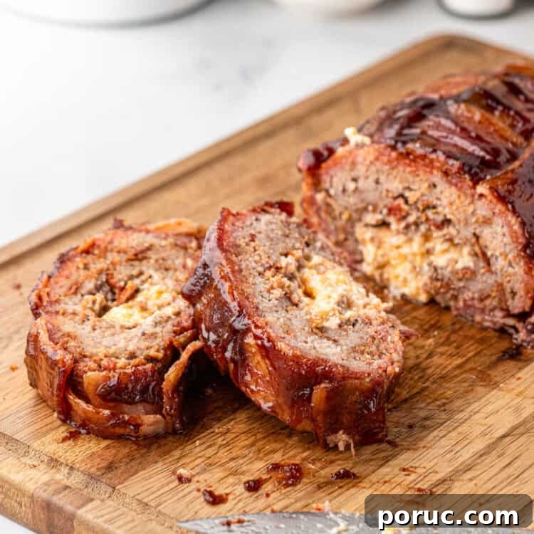 Ultimate Bacon Explosion Recipe: Stuffed Bacon-Wrapped Meatloaf 17 Close square image of Bacon Explosion sliced on cutting board