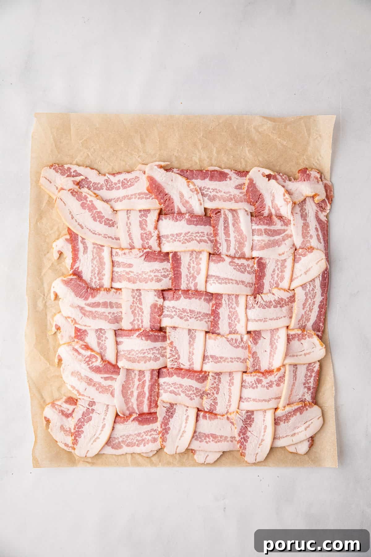 Ultimate Bacon Explosion Recipe: Stuffed Bacon-Wrapped Meatloaf 4 Bacon weaved on cooking paper for Bacon Explosion recipe