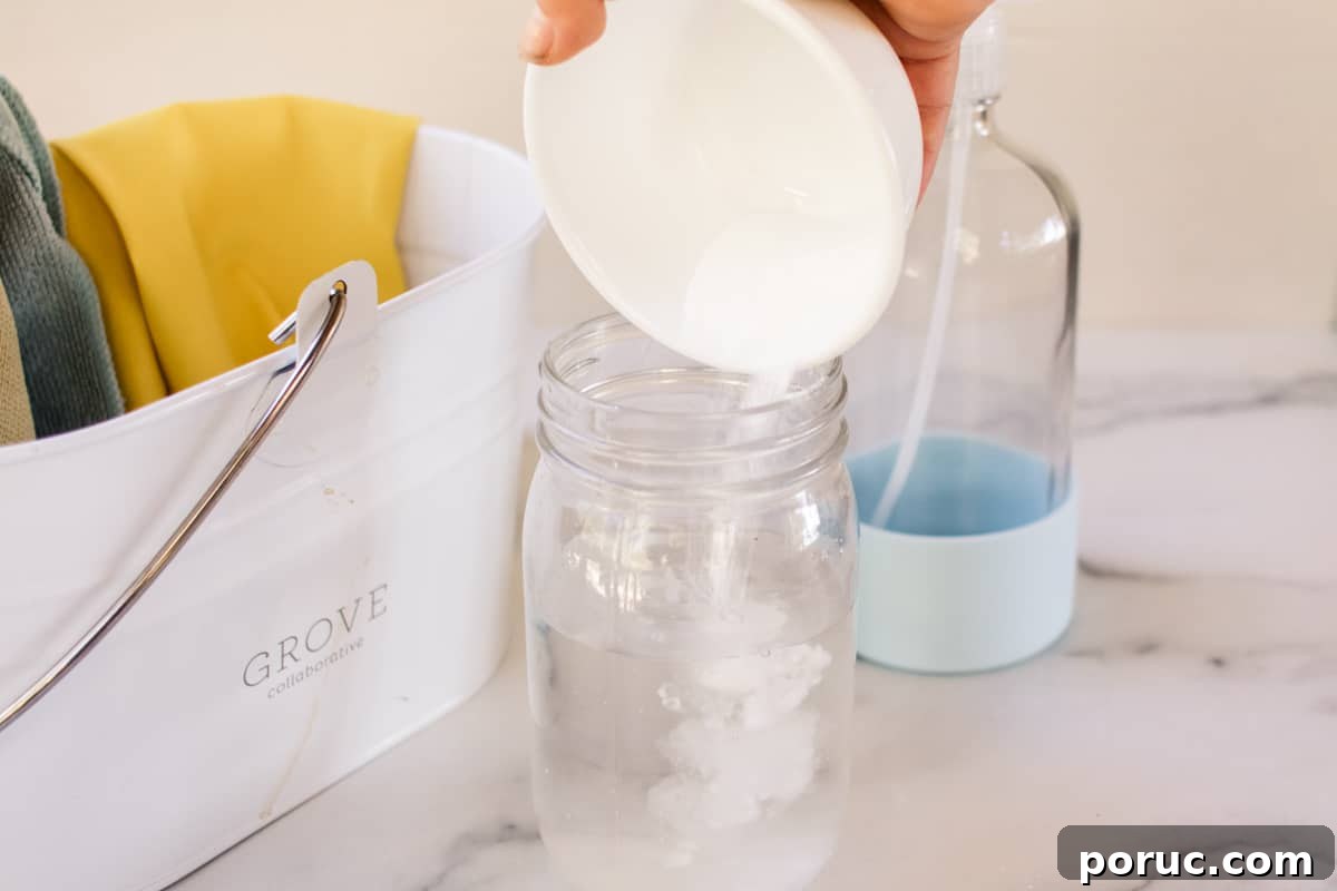 Remove Mold from Shower Grout Fast: Proven Step-by-Step Method 3 Adding baking soda to water to make a mold spray for tile grout.