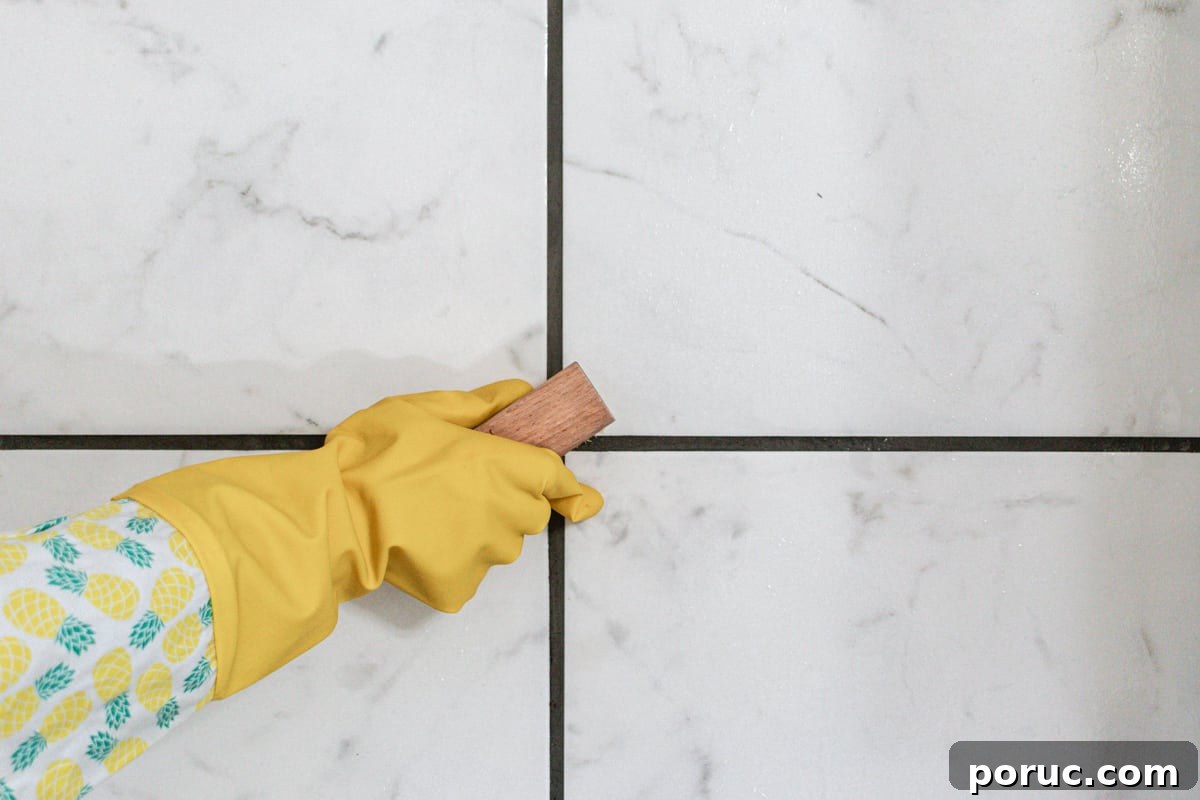 Remove Mold from Shower Grout Fast: Proven Step-by-Step Method 7 Using a scrub brush, while wearing protective gloves to scrub any mold spots loose.