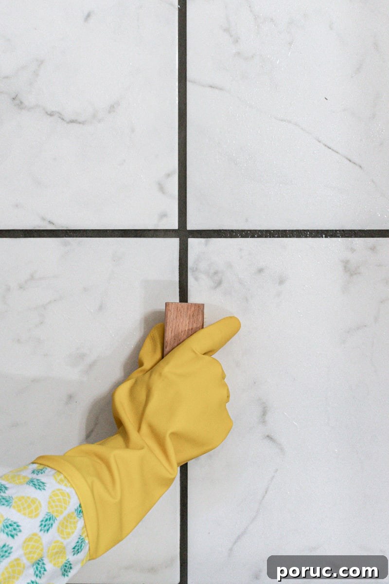 Remove Mold from Shower Grout Fast: Proven Step-by-Step Method 9 Re scrubbing a few spots on the grout with more of the spray and a scrub brush.