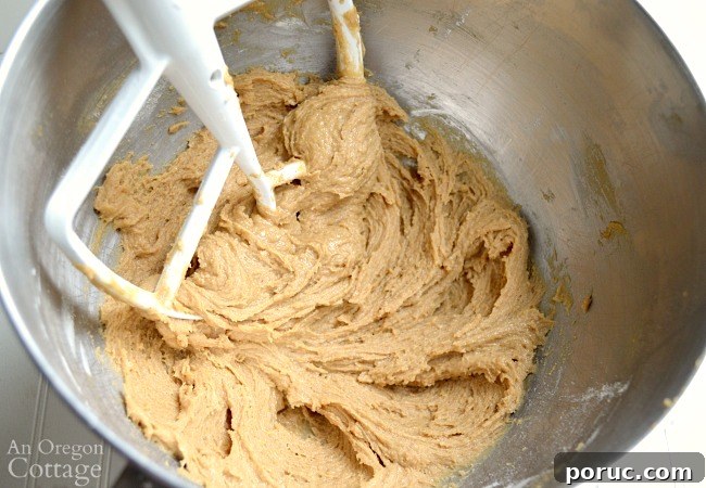 Classic Chocolate Peanut Butter Swirl Bars Recipe — Decadent Homemade Treat 5 Peanut Butter Swirl Bars dough mixed in bowl