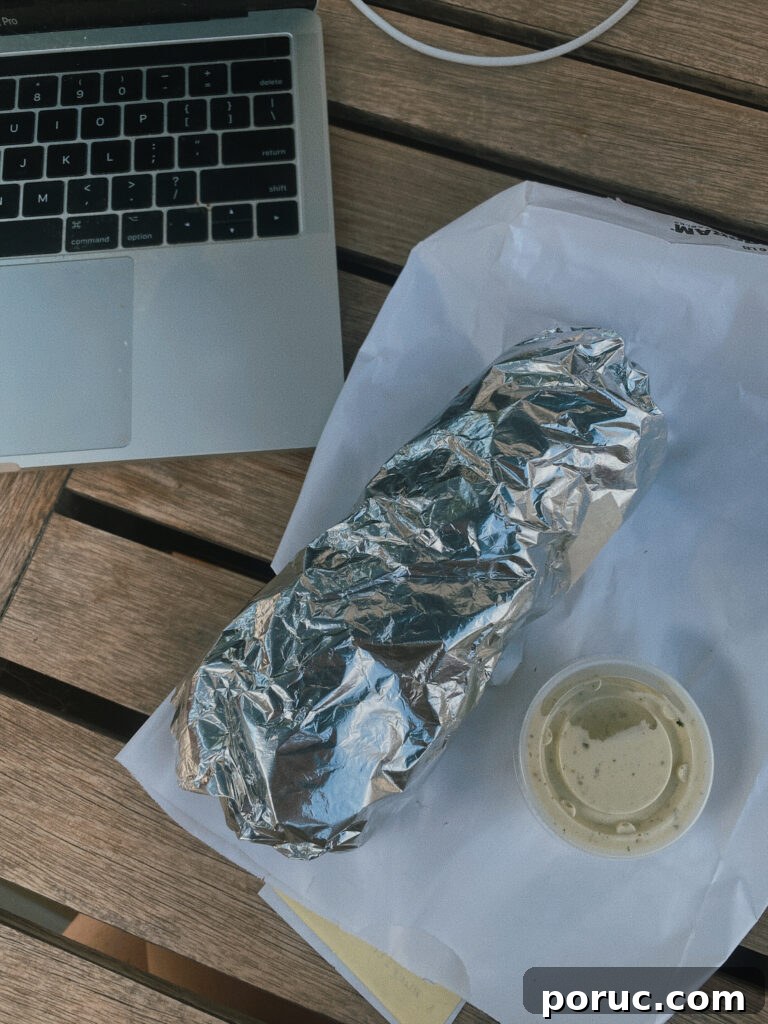 Skier’s Breakfast Burrito at Beaumont Bakery: A Savory Morning Bite 2 breakfast burrito in tinfoil