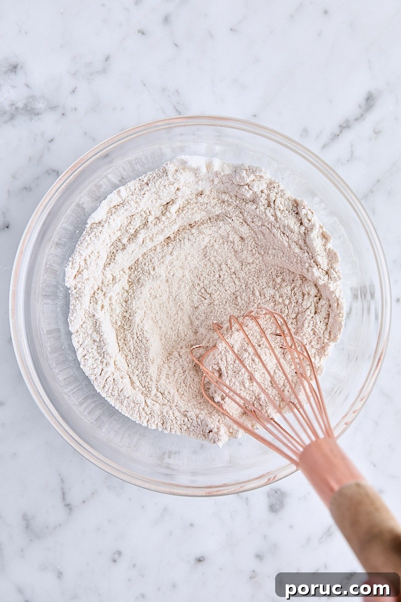 Flour, sugar, cinnamon, and salt whisked together in a small bowl