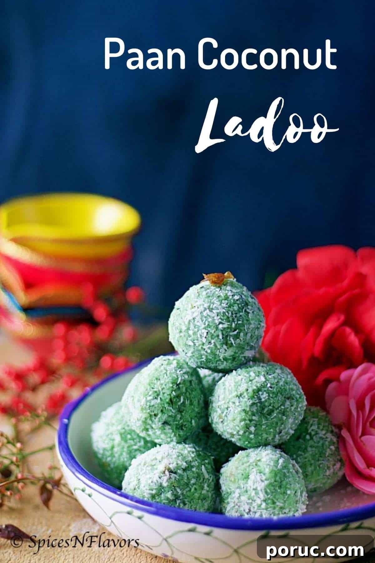 Paan Coconut Ladoo Recipe: How to Make Minty Indian Sweets 2 ladoos stacked on each other sitting on a blue rim bowl