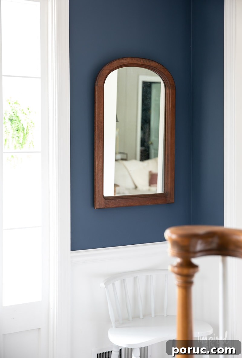Hidden Vintage Treasures: My Latest Retro Finds and Collectibles 9 Wood arched mirror leaning against wall