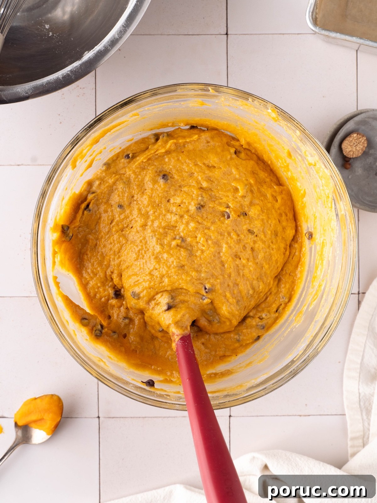 Sourdough pumpkin bread batter mixed in a bowl
