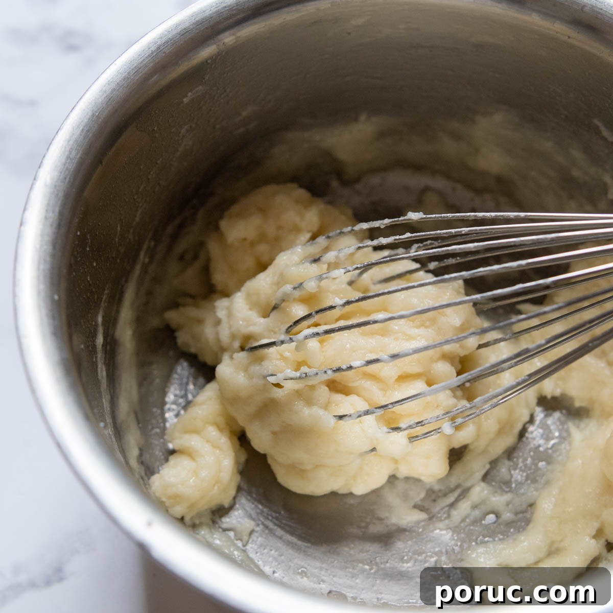 Velvety Gluten-Free Gravy Without Pan Drippings — Thickener Tips 4 thickener whisked in the pot for gravy.
