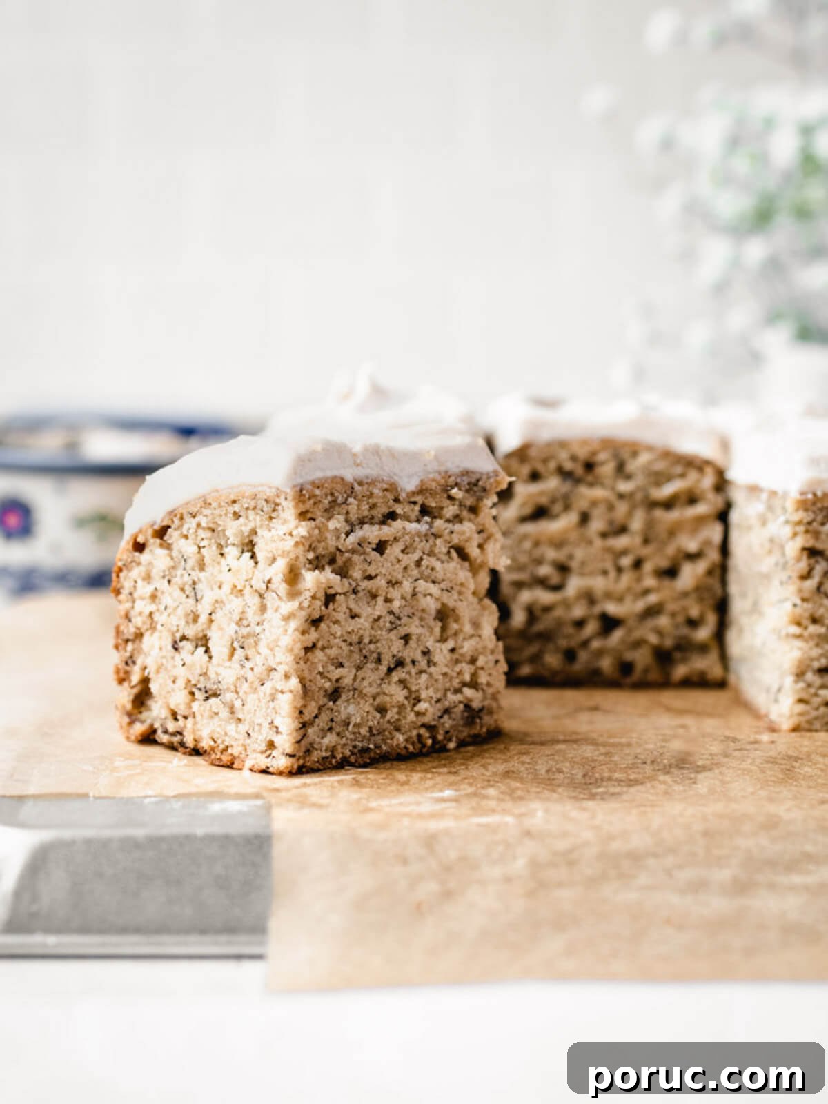 Moist Banana Snack Cake Recipe for Quick Homemade Treat 4 A slice of Banana Snack Cake with frosting waiting to be served.