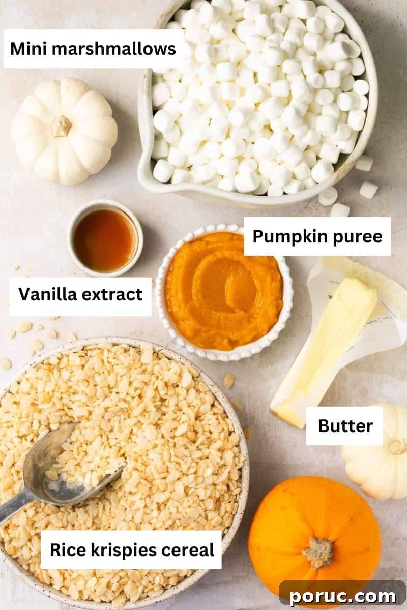 Pumpkin Marshmallow Rice Krispie Treats for Fall Parties 3 Ingredients for pumpkin Rice Krispie treats separated into bowls including marshmallows, pumpkin puree, butter and rice crisps cereal.