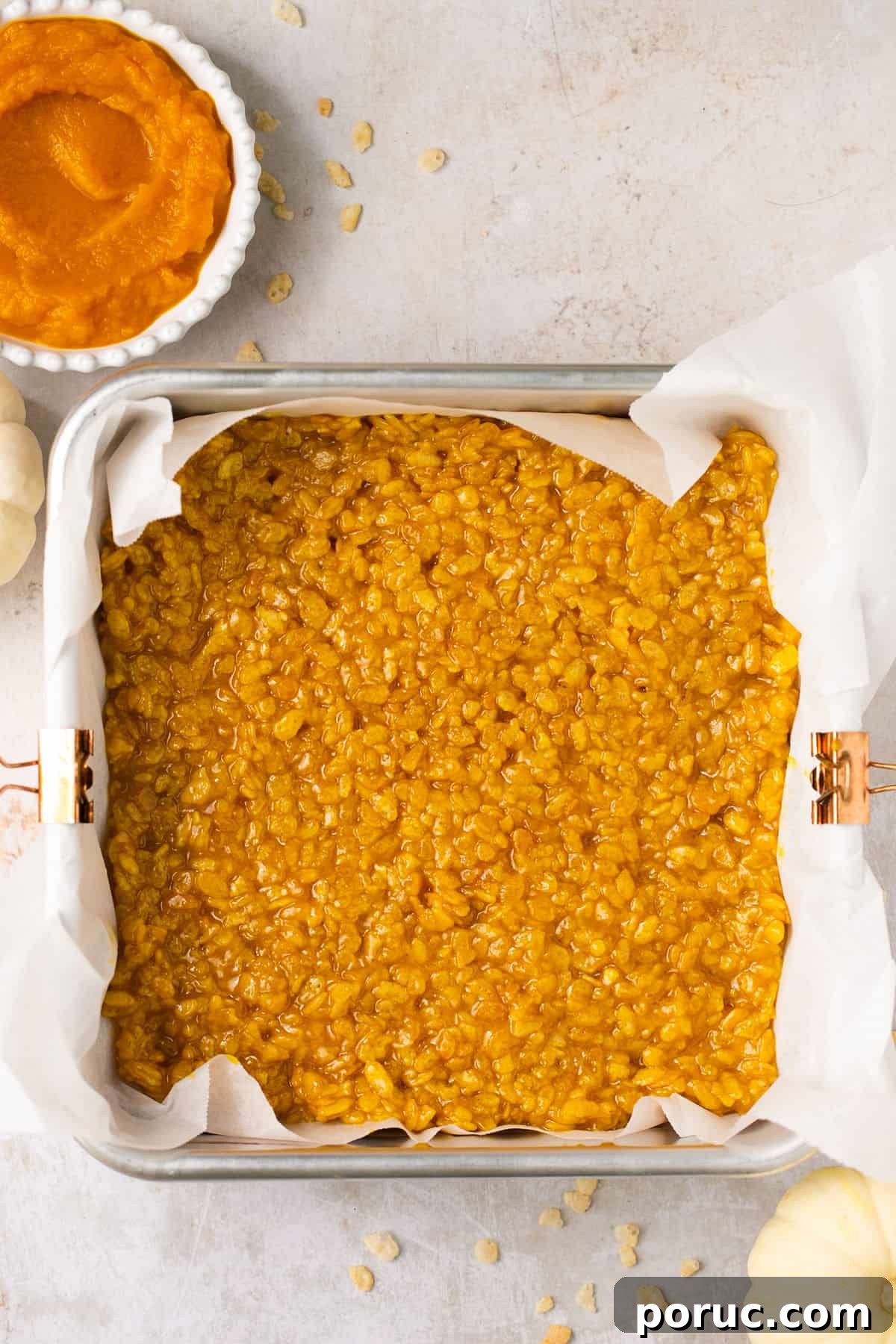 Pumpkin Marshmallow Rice Krispie Treats for Fall Parties 6 A pan full of pumpkin Rice Krispie treats.