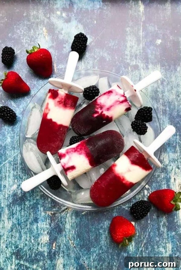 Crustless Blueberry Pie Recipe: Quick, Creamy Summer Dessert 12 Berry Cheesecake popsicles stacked on a bowl of ice