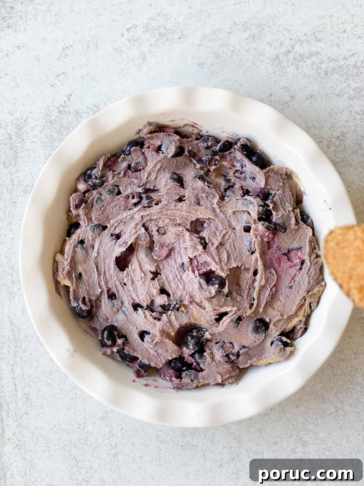 Crustless Blueberry Pie Recipe: Quick, Creamy Summer Dessert 8 Blueberry pie in a dish before baking.