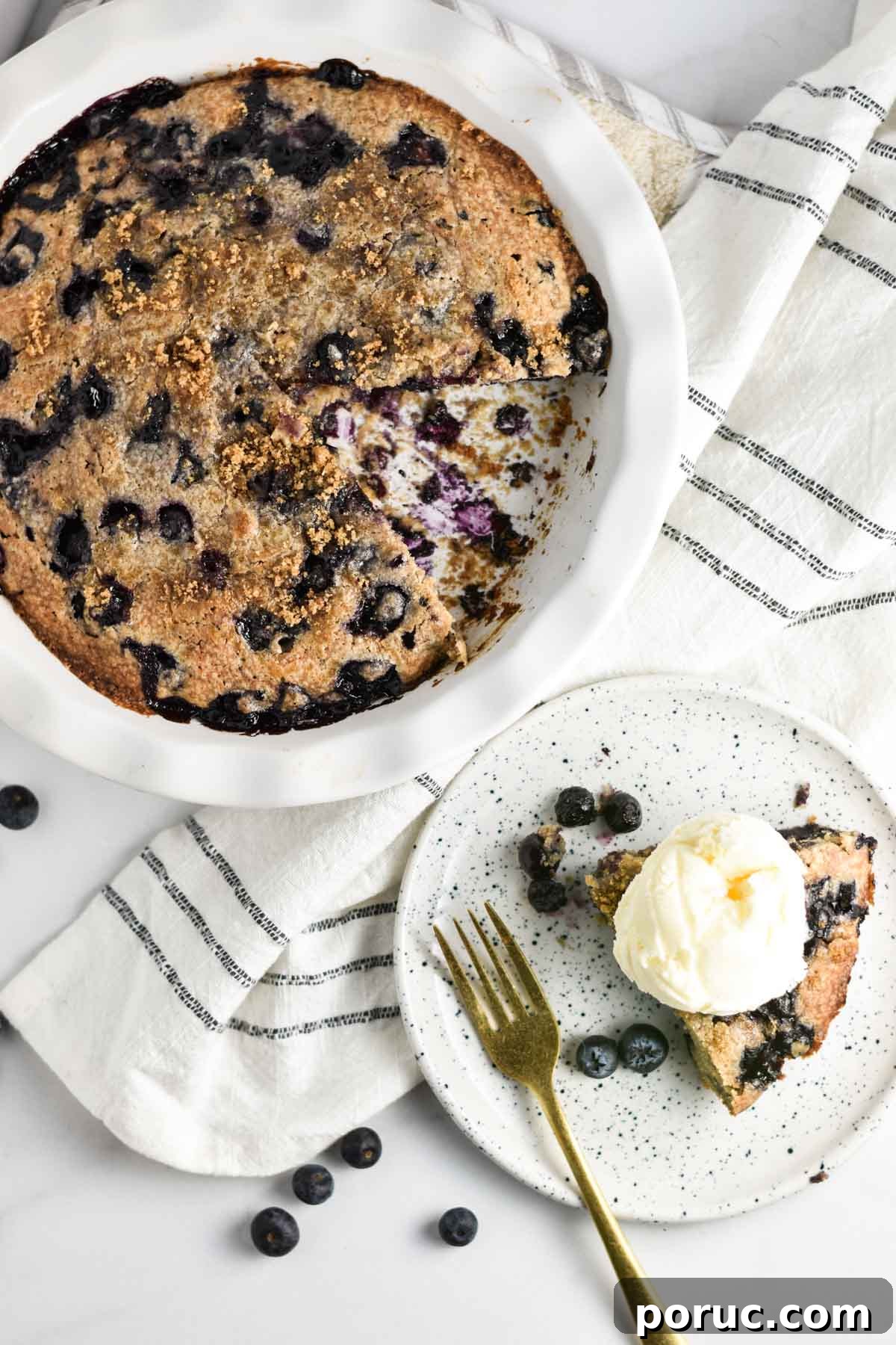 Crustless Blueberry Pie Recipe: Quick, Creamy Summer Dessert 10 A slice of blueberry pie without crust next to a whole pie dish.