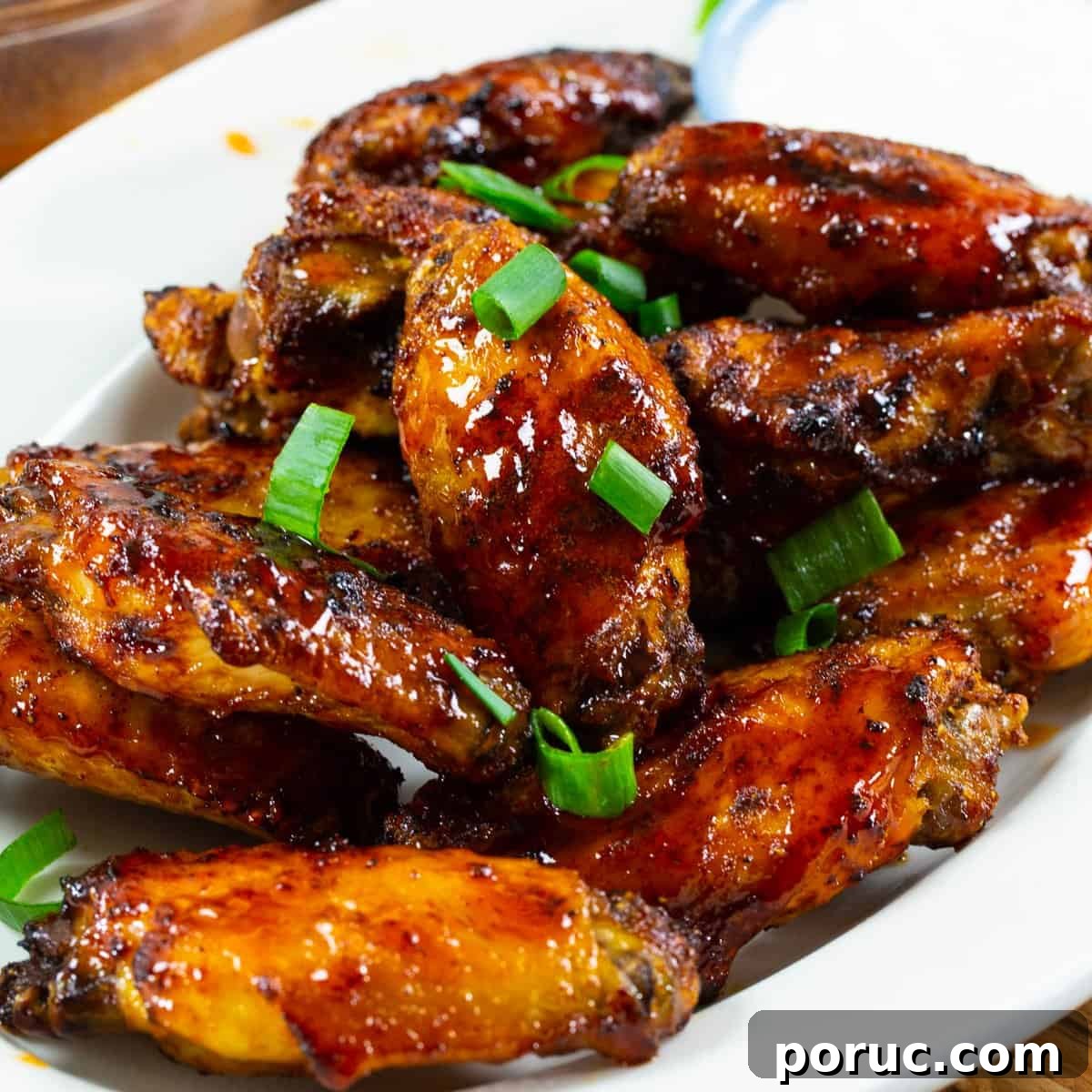Air Fryer Honey Sriracha Wings on a plate.