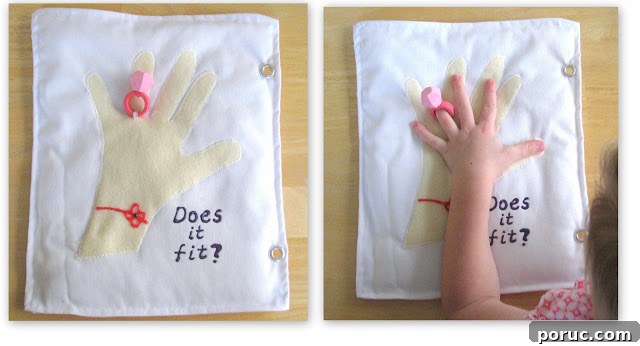 quiet book page with hand and ring. Child putting hand through ring.