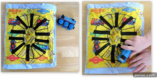 railroad track quiet book page with small wooden train toy