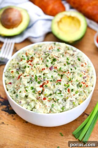 Image of bowl with avocado egg salad.