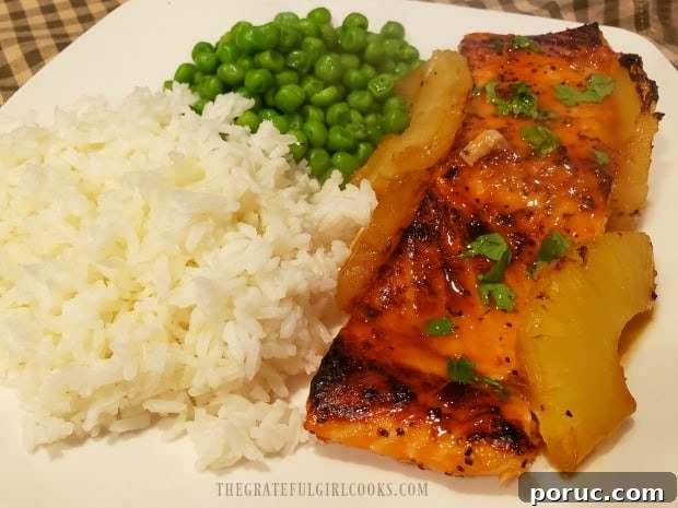 Sweet Spicy Salmon served Sweet Spicy Salmon served with rice and peas