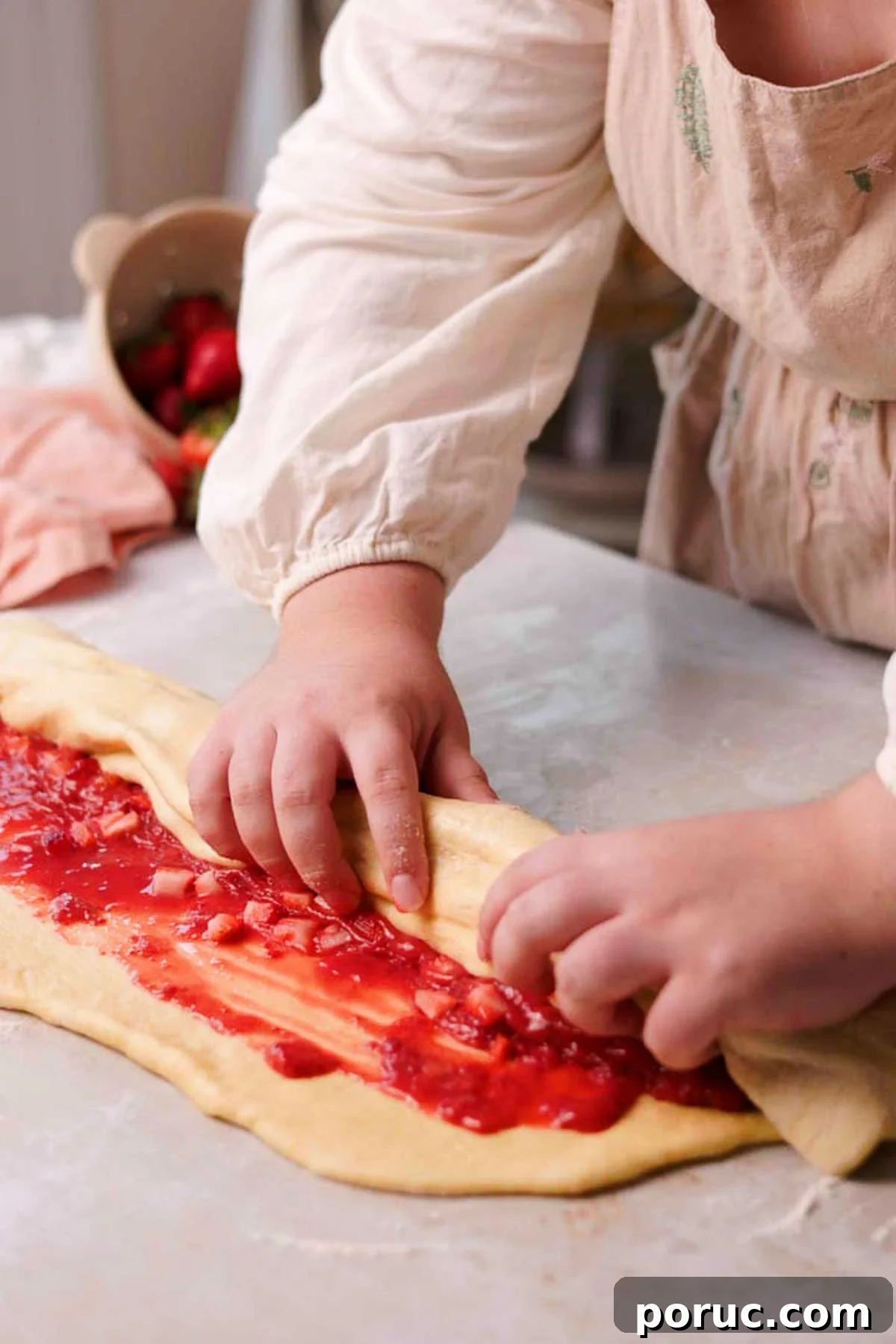 Strawberry Cinnamon Roll Recipe — Soft, Sweet, Homemade Treat 14 rolling strawberry cinnamon rolls by hand