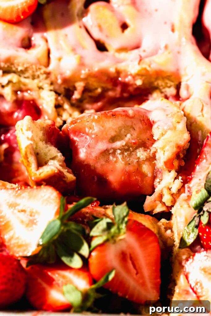 Strawberry Cinnamon Roll Recipe — Soft, Sweet, Homemade Treat 3 gooey strawberry cream cheese roll texture