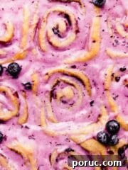 blueberry cinnamon rolls with blueberry cream cheese glaze