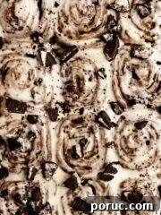 cinnamon rolls from the top with cream cheese frosting and oreos