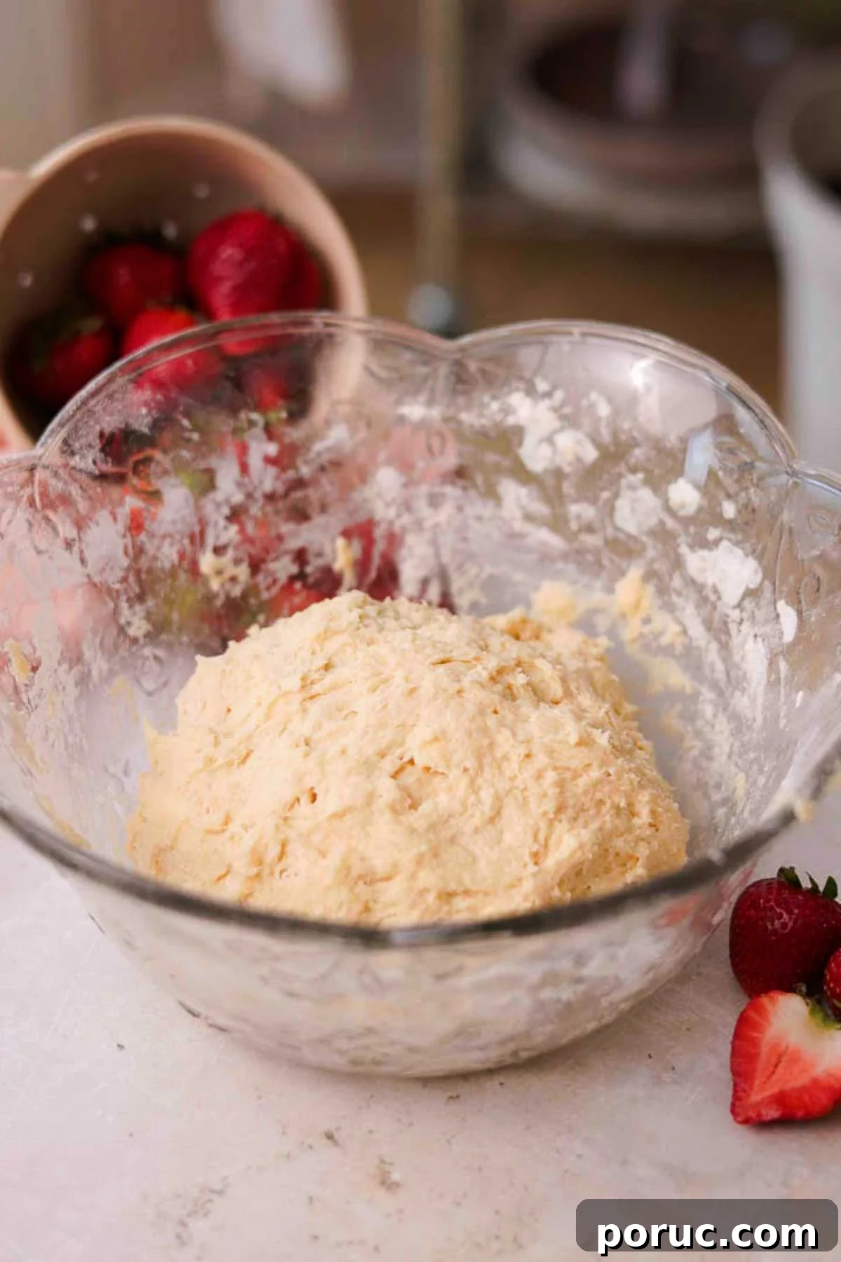 Strawberry Cinnamon Roll Recipe — Soft, Sweet, Homemade Treat 9 ball of dough in a large glass bowl