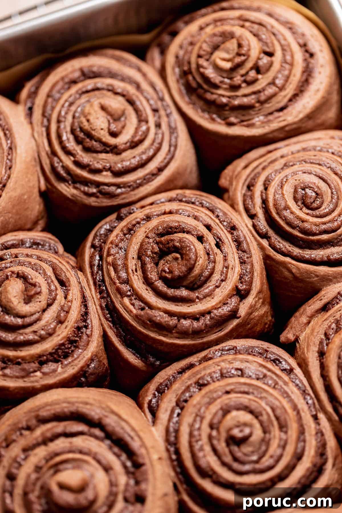 Chewy Cosmic Brownie Roll Recipe with Sprinkle Filling 9 A close up of the baked brownie rolls right after pulling them out of the oven.
