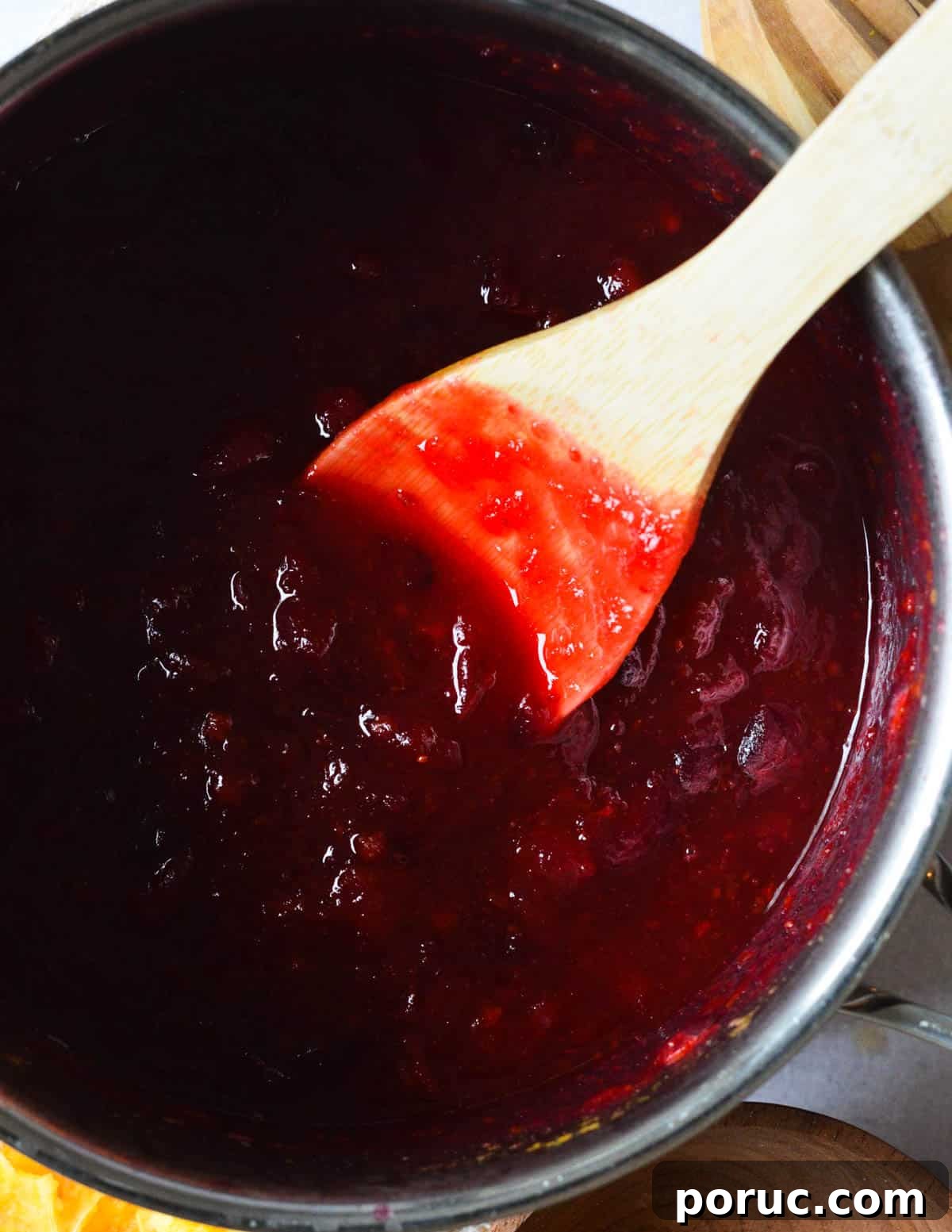 a pot of cranberry sauce. 