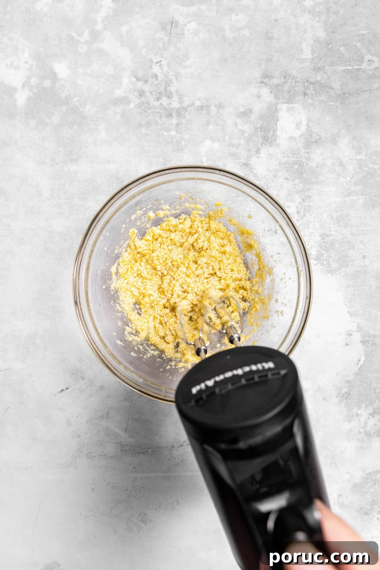Elegant Lemon Sugar Cookies with Minimal Effort 6 Wet ingredients being beaten into butter and sugar mixture