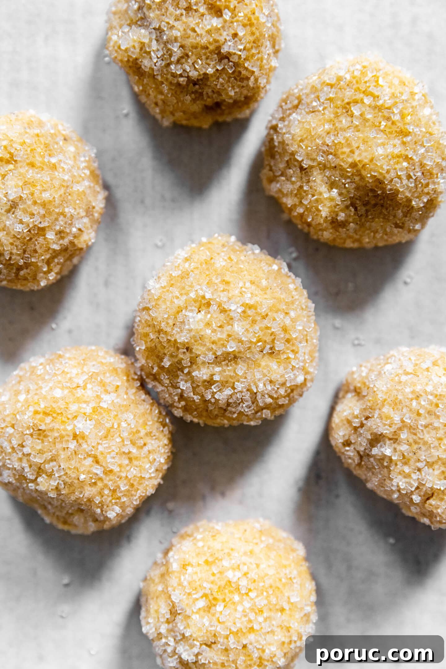 Elegant Lemon Sugar Cookies with Minimal Effort 8 Lemon sugar cookie dough rolled in sparkling sugar on a sheet pan