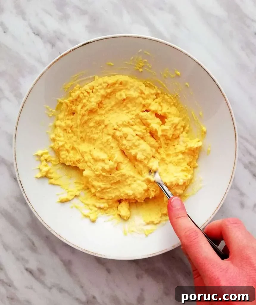 Classic Southern Deviled Eggs Recipe for Gatherings 5 deviled eggs egg yolk mixture in bowl