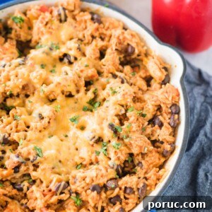 Southwest Chicken Skillet Recipe with Peppers and Black Beans 13 enamel cast iron skillet with the recipe inside