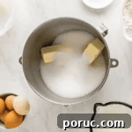 Whipped Cotton Candy Cake Recipe for Celebratory Parties 6 butter and sugar in the bowl of a stand mixer.