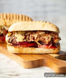hunters chicken sandwich 2 hunters chicken sandwiches on wooden board with one in front of the other