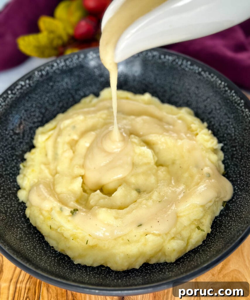 Creamy Southern-Style Yellow Gravy Without Drippings 2 yellow gravy without drippings drizzled over mashed potatoes