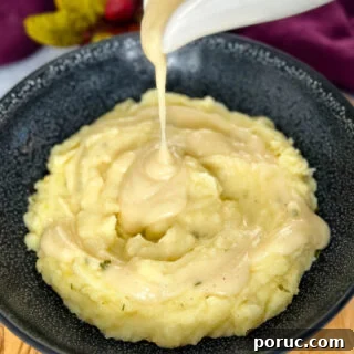 Creamy Southern-Style Yellow Gravy Without Drippings 7 yellow gravy without drippings drizzled over mashed potatoes
